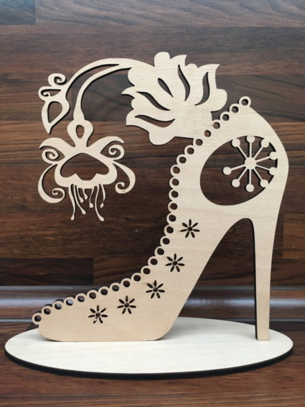 Laser Cut Ladies Shoe Shaped Jewelry Stand CDR Free Vector