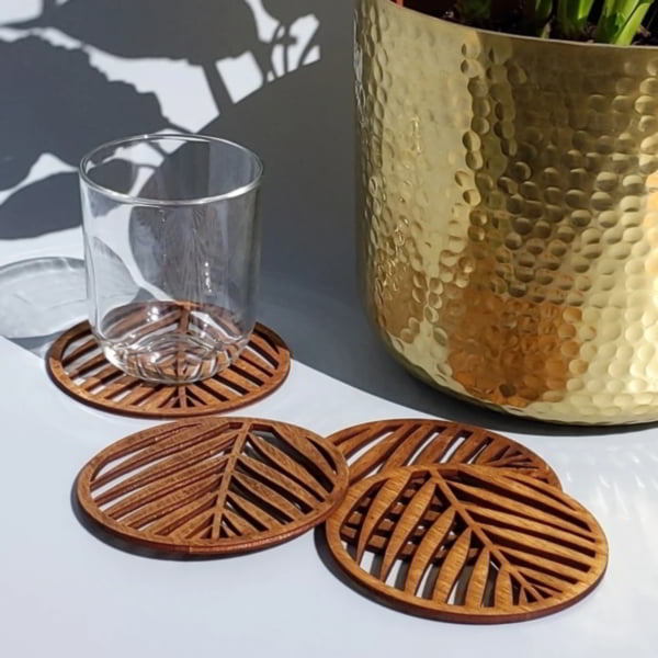 Laser Cut Wooden Circle with Leaves Hot Tea Coaster Layout Free DXF and CDR File