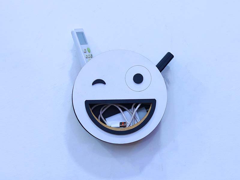 Laser Cut Cute Smiley Face Wall Mounted Remote Holder 3mm Free Vector