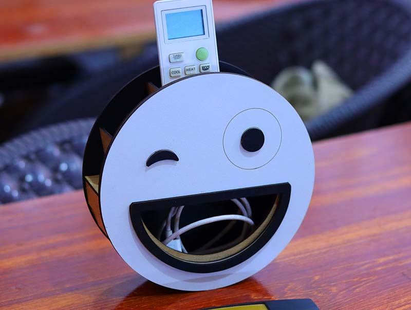 Laser Cut Cute Smiley Face Wall Mounted Remote Holder 3mm Free Vector