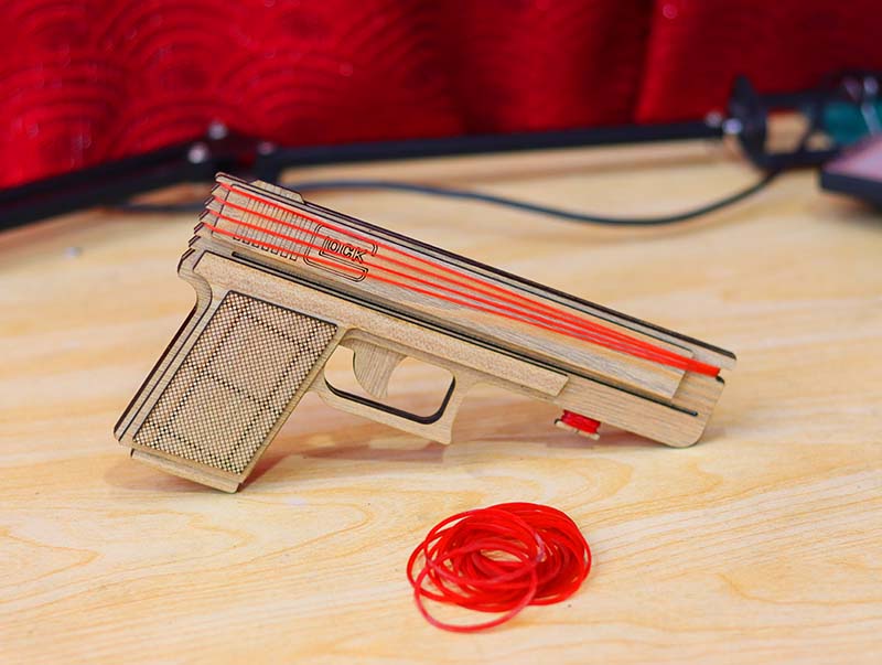 Laser Cut Rubber Band Gun Toy Model with Auto Loading Vector File
