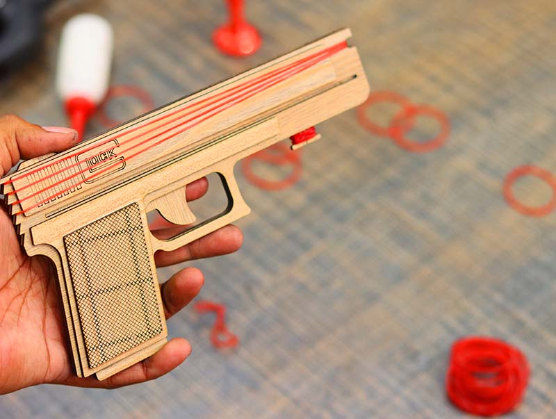 Laser Cut Rubber Band Gun Toy Model with Auto Loading Vector File