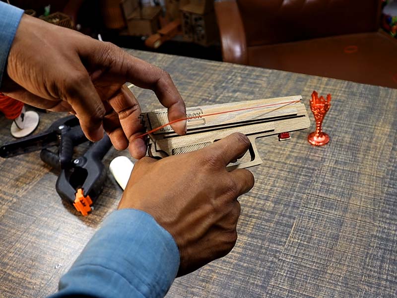 Laser Cut Rubber Band Gun Toy Model with Auto Loading Vector File
