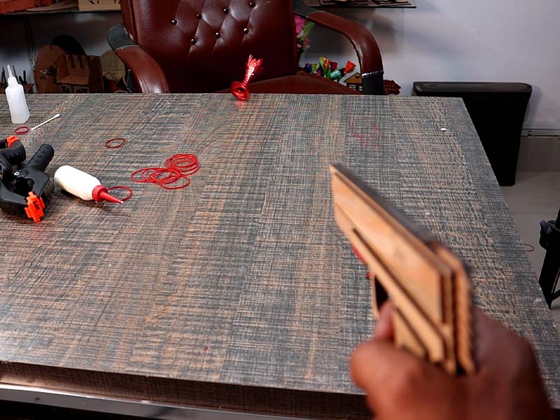 Laser Cut Rubber Band Gun Toy Model with Auto Loading Vector File