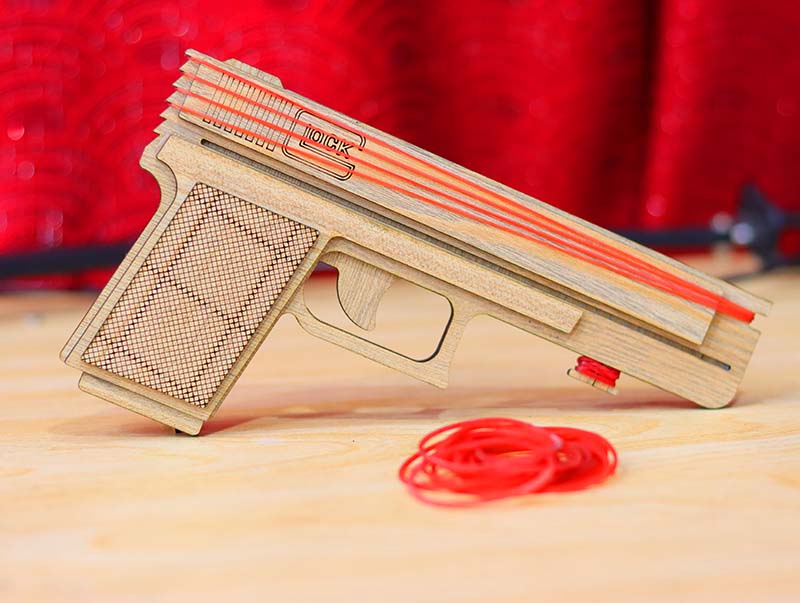 Laser Cut Rubber Band Gun Toy Model with Auto Loading Vector File