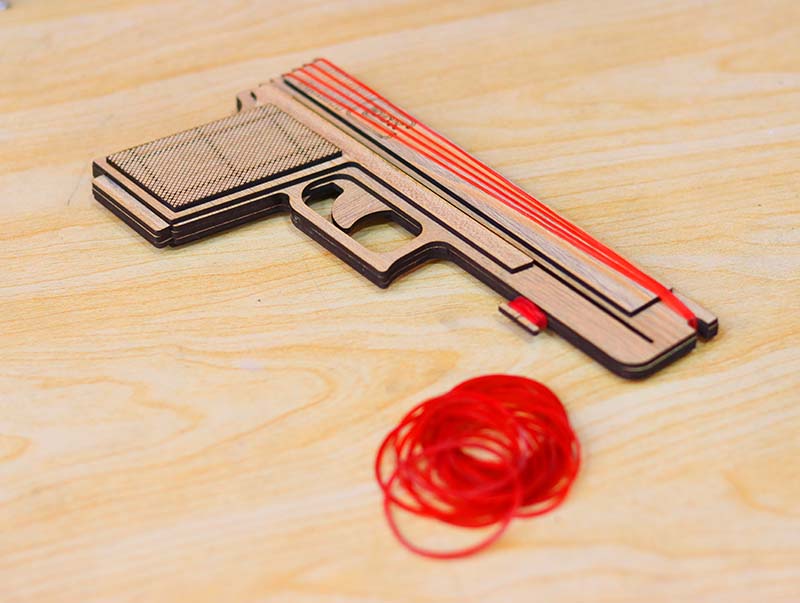 Laser Cut Rubber Band Gun Toy Model with Auto Loading Vector File