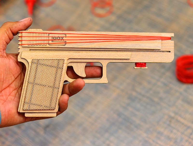 Laser Cut Rubber Band Gun Toy Model with Auto Loading Vector File
