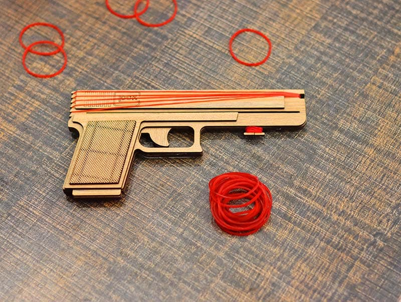 Laser Cut Rubber Band Gun Toy Model with Auto Loading Vector File