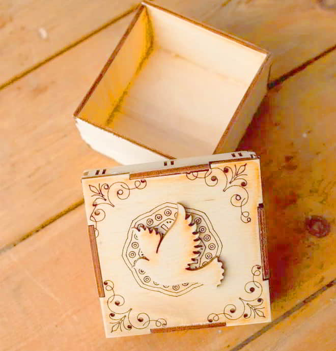 Laser Cut Wooden Storage Box With Pigeon Decor Free Vector